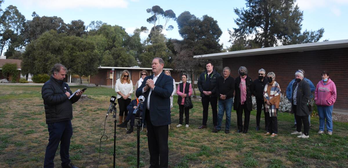 MP Tim McCurdy addresses the media at Merriwa Grove last week with families and Social Plus' Michael Thompson watching on. Picture from Cobram Courier