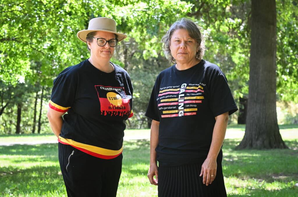 Indigenous women Davina Jackson and Ruth Davys in Albury's Noreuil Park where they spoke to visitors about Australia's history. Picture by Mark Jesser