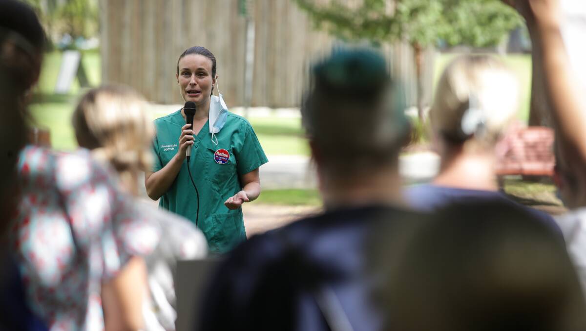 Doctor turned MP Amanda Cohn speaking to a nurses rally in her medical attire. She is now driving a new hospital letter-writing campaign aimed at Health Minister Ryan Park. 