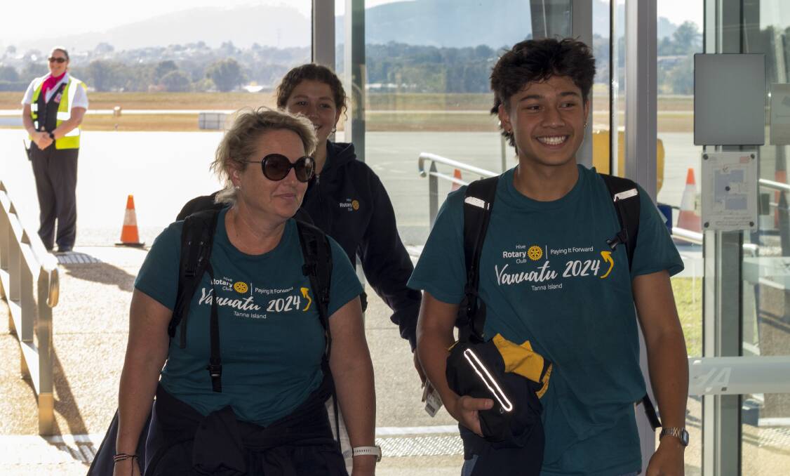 In familiar surrounds, Kellie Kadaoui, Romy von Olearius (at rear) and Daniel Larsen walk into Albury airport after Qantas flight from Sydney following the docking of cruise ship hours earlier. Picture by Layton Holley