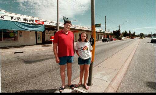 Flashback: Jim Crawford with his then teenage daughter Kate in the Mate Street median strip in front of the post office in March 1997. At the time he was concerned about roadworks on what was then part of the Hume Highway.