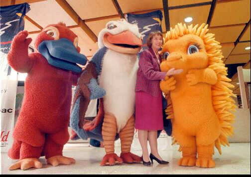 Patricia Gould with Sydney Olympics mascots Olly, Syd and Millie in 1997 when they visited Albury as part of a promotion. Mrs Gould was among those who ran a leg of the Olympic torch relay.