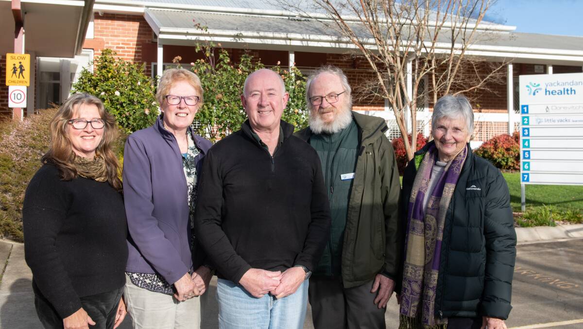 New Yackandandah Health board members Diane Shepheard, Margo Northey and Patten Bridge with two departing directors Doug Westland and Heather Maddock outside the aged care home. Picture by Tara Trewhella