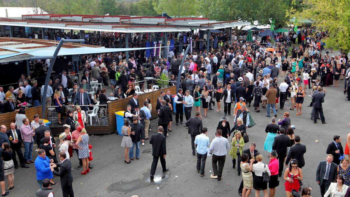 Punters gather around the betting ring at the Albury Gold Cup. Councillor Ashley Edwards believes the city should not be endorsing such activity with backing for a holiday.