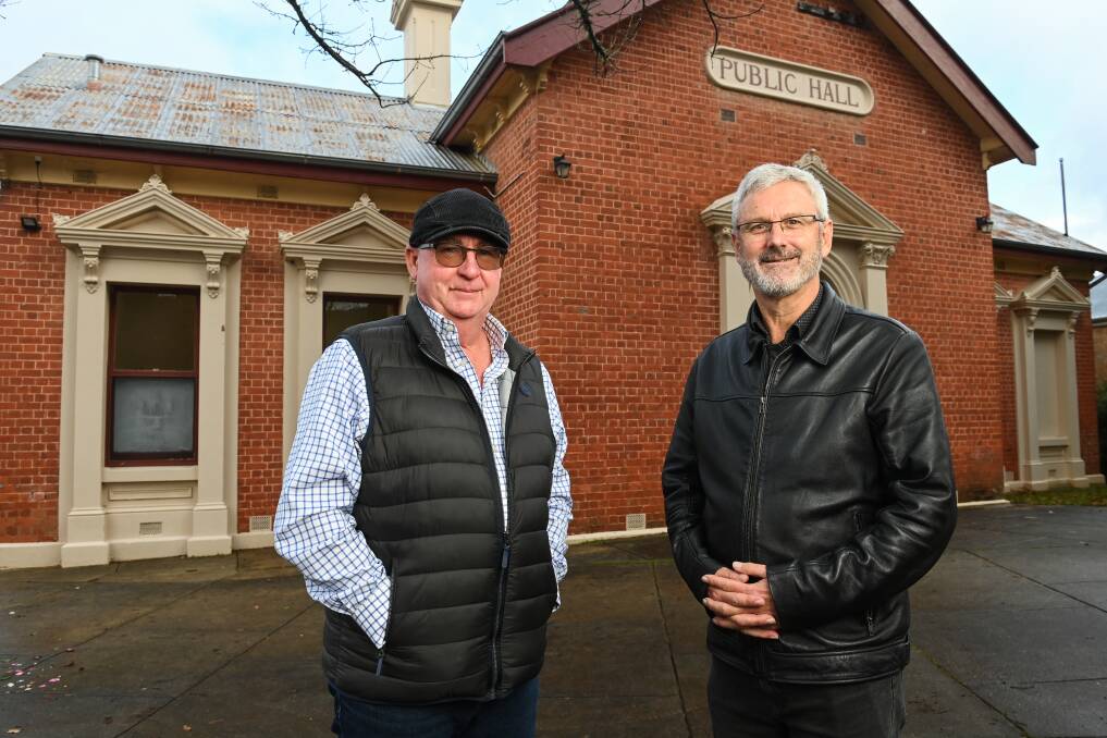 Apollo Care representatives Wayne Knapp and Steve Becsi outside the hall at Yackandandah where a public meeting was set for Monday June 19, 2023. Picture by Mark Jesser