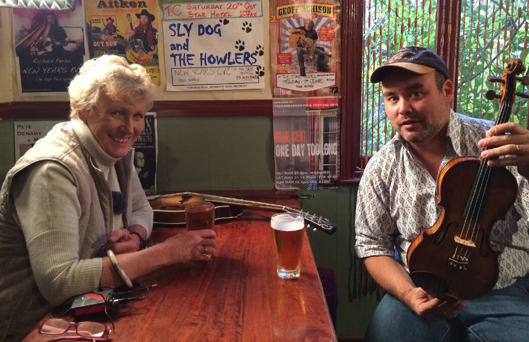 Small talk: ABC journalist Heather Ewart with Yackandandah musician Pete Denahy who features in her television show about country towns next Monday. 