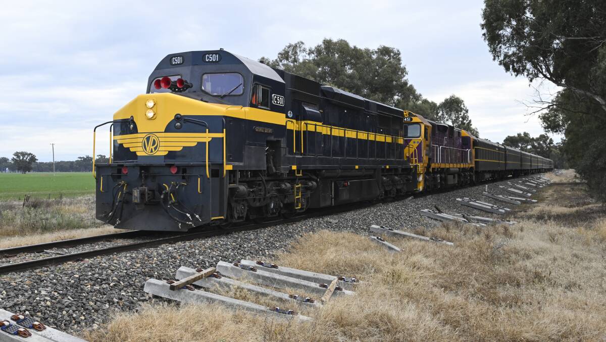 The heritage passenger train heads south to Benalla on Saturday with scores on board enjoying the chance to ride along a corridor long closed to regular services. Picture by Mark Jesser