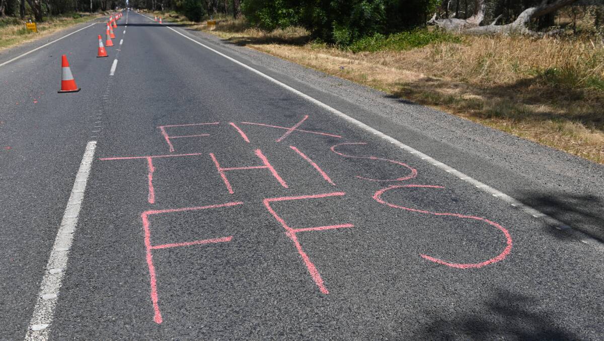 Intemperance with the state of North East roads as shown with this message sprayed on the Murray Valley Highway is being reflected in council surveys. Picture by Mark Jesser