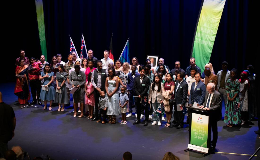 New citizens gathered at this year's council Australia Day event in Wodonga with mayor Ron Mildren at the lectern. The Cube is set to be a repeat home for January 26 formalities. File picture