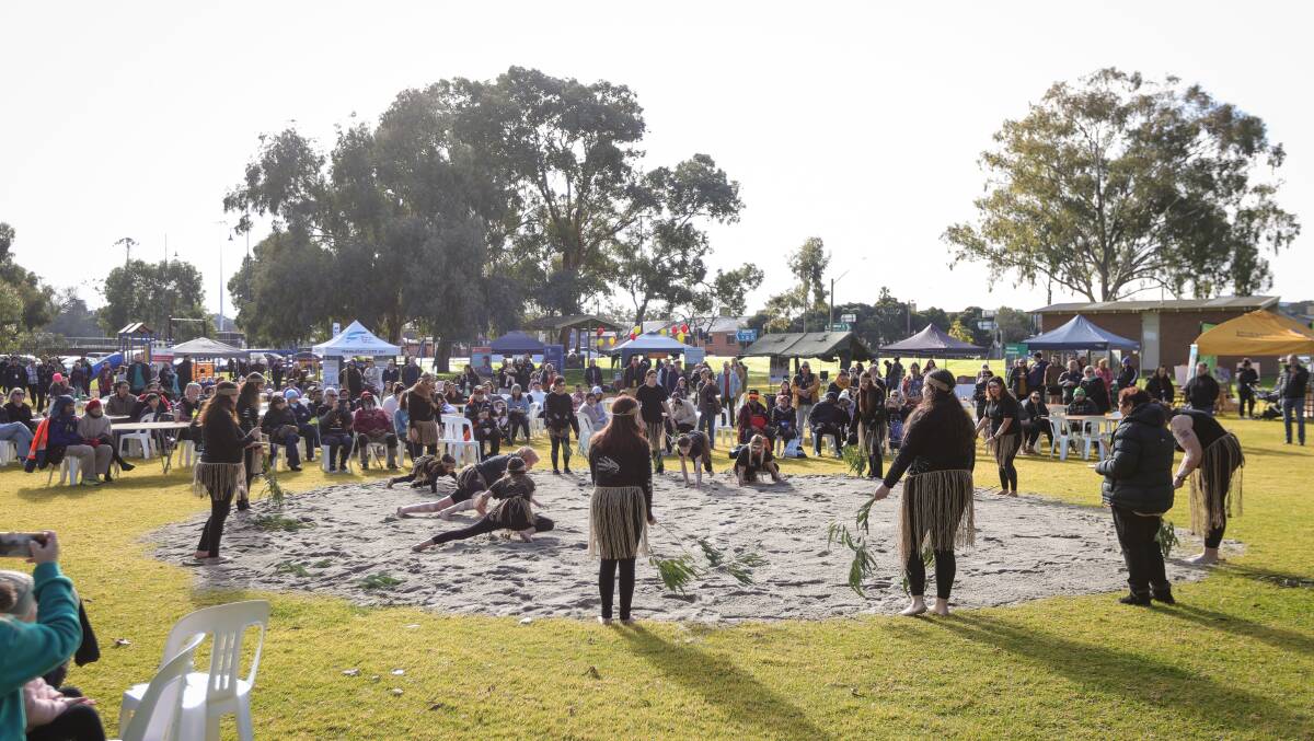 With the sky still overcast, the Aboriginal women's dance group took to a sandy circle to perform at the NAIDOC event in Albury.