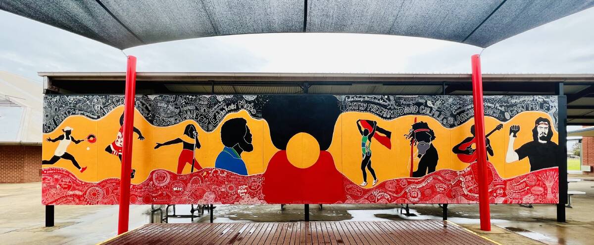 A mural featuring Ash Barty, Adam Goodes, Jessica Mauboy, Eddie Mabo, Cathy Freeman, David Gulpilil, Archie Roach and Gary Foley which can be found at Deniliquin High School. Picture from Facebook.