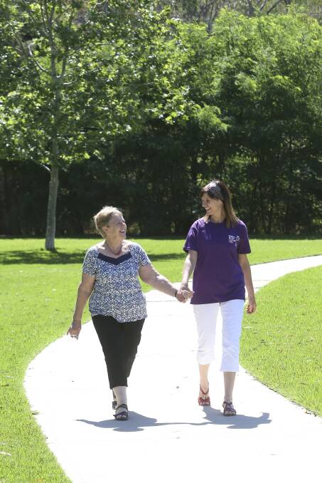 Ready to walk: Joan Cummins with her daughter Cathy Kennedy on the path at Padman Park which will form part of the Walk4BrainCancer.