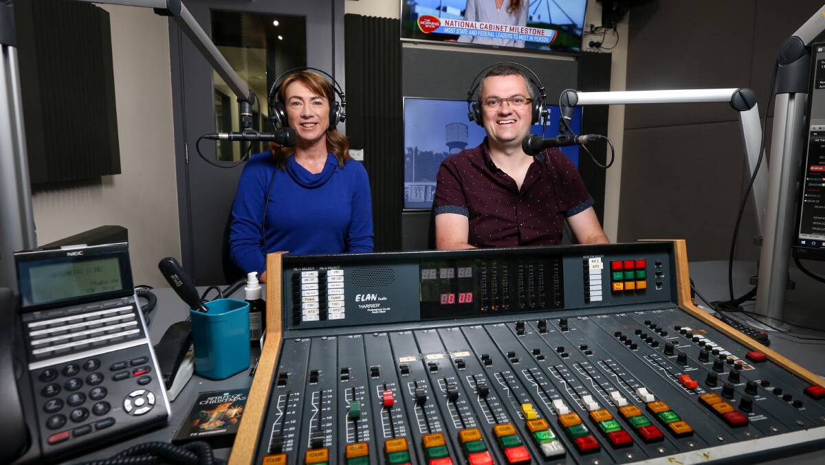 Kylie King and Kev Poulton during their time on-air with the 2AY breakfast show which saw them interview John Blackman after an unexpected call to the station.