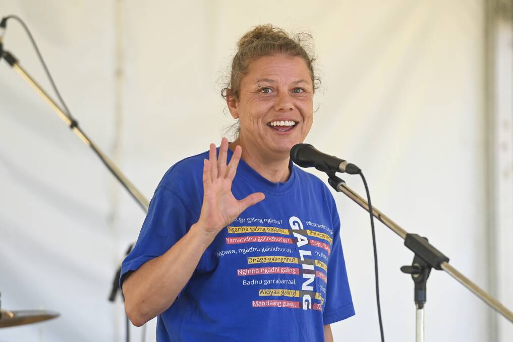 Ruth Davys, pictured in a T-shirt with Wiradjuri language and English translations, will be at Albury's Noreuil Park on Australia Day.