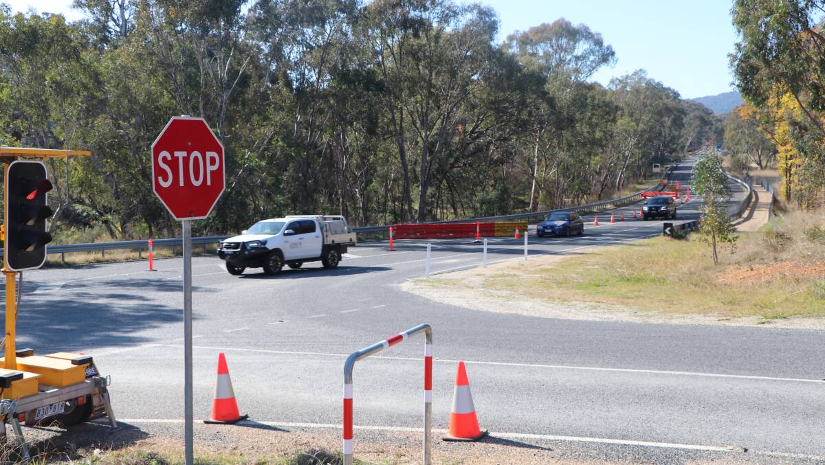 A section of the Beechworth-Wodonga Road near Star Lane, looking north, is reduced to one lane and subject to traffic signals because of a damaged culvert.