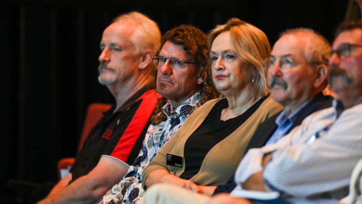 Albury deputy mayor Steve Bowen (second from left) at the Albury Wodonga Health annual meeting in February 2023 sitting next to Wodonga councillor Libby Hall who recently took a swipe at Albury councillors over hospital advocacy.