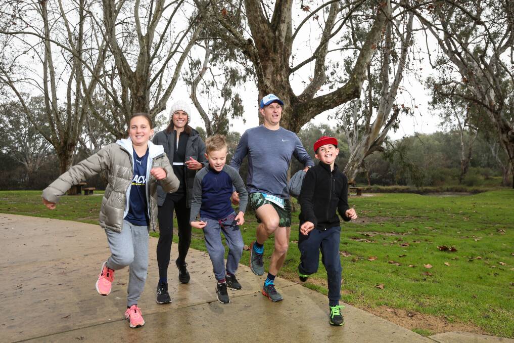 Family affair: The Wilkersons, Millie, 12, mum Nic, Ned, 7, dad Tony and Duke,8, all ran Gold Coast events in Albury on Saturday and Sunday. They included five and 12-kilometres runs and a half marathon and marathon. Pictures: JAMES WILTSHIRE