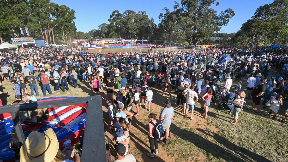 A huge crowd gathers for a rodeo at the Kinross hotel. Albury councillor Stuart Baker raised concerns about poor parking he saw at such an event.