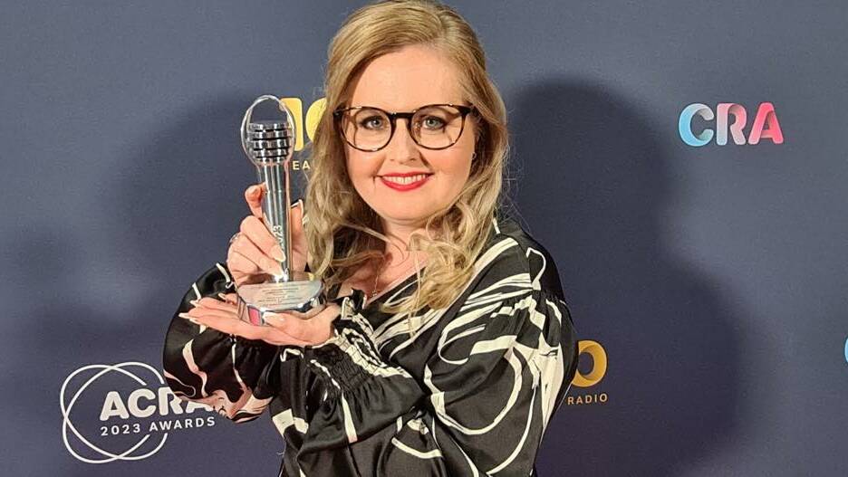 Cassie Aldridge with her trophy at the Australian Commercial Radio Awards held in Sydney on Saturday.