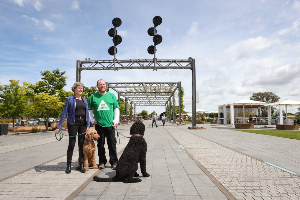 Greens hopes for Victoria's Upper House, Cate Sinclair, and Benambra, Luke Brady, in Wodonga with the former's dogs Saffron and Harley. Picture by James Wiltshire.