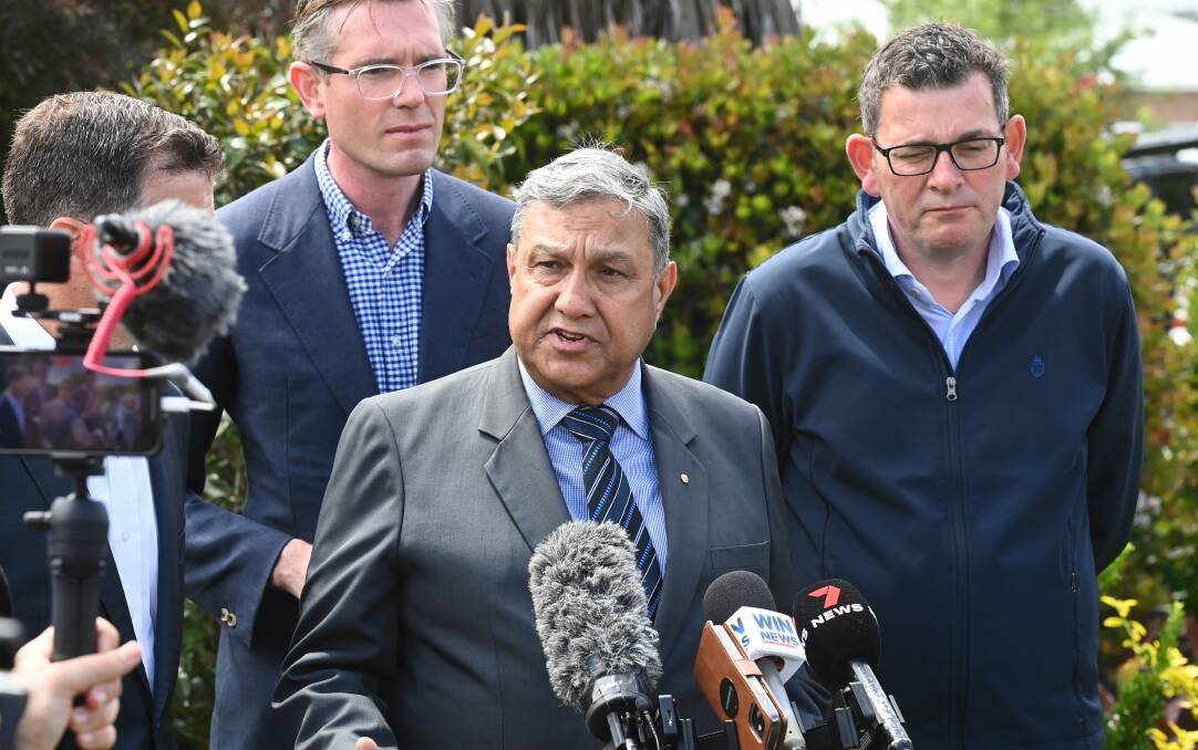 Albury Wodonga Health board chairman Matt Burke, with NSW Premier Dominic Perrottet and Victorian Premier Daniel Andrews in October, is facing questions on Border hospital deal announced then. Picture by Mark Jesser