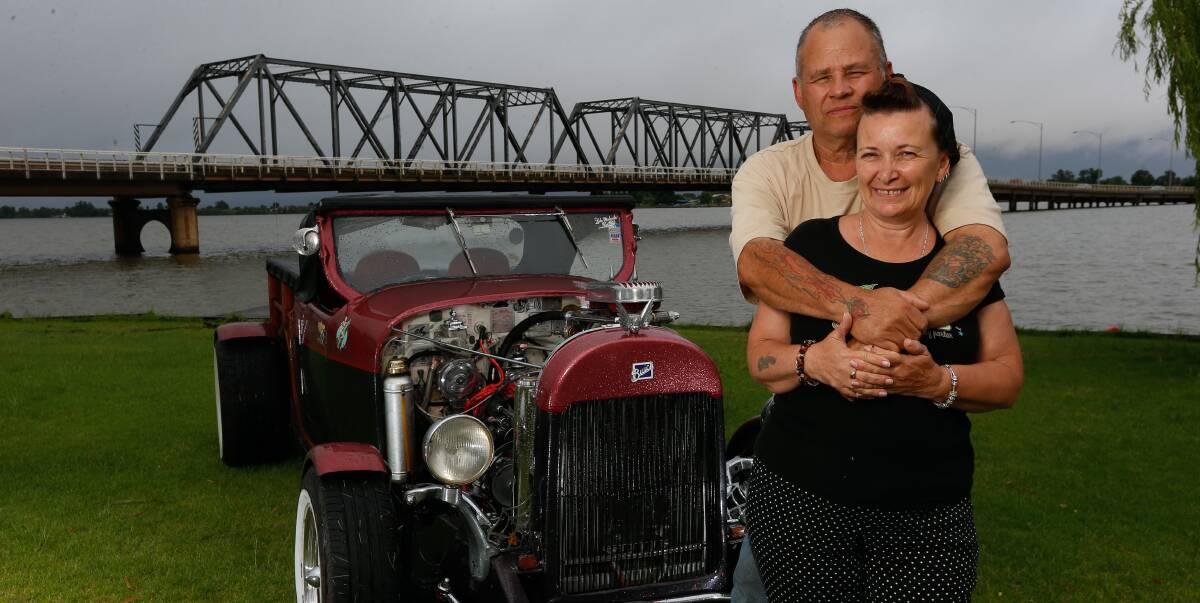 Ripping roadster: Carolyn and Steve Luckhurst with their 1923 Buick, which is one of only two of its type on the road in Australia. Another three are being restored. Picture: MARK JESSER 