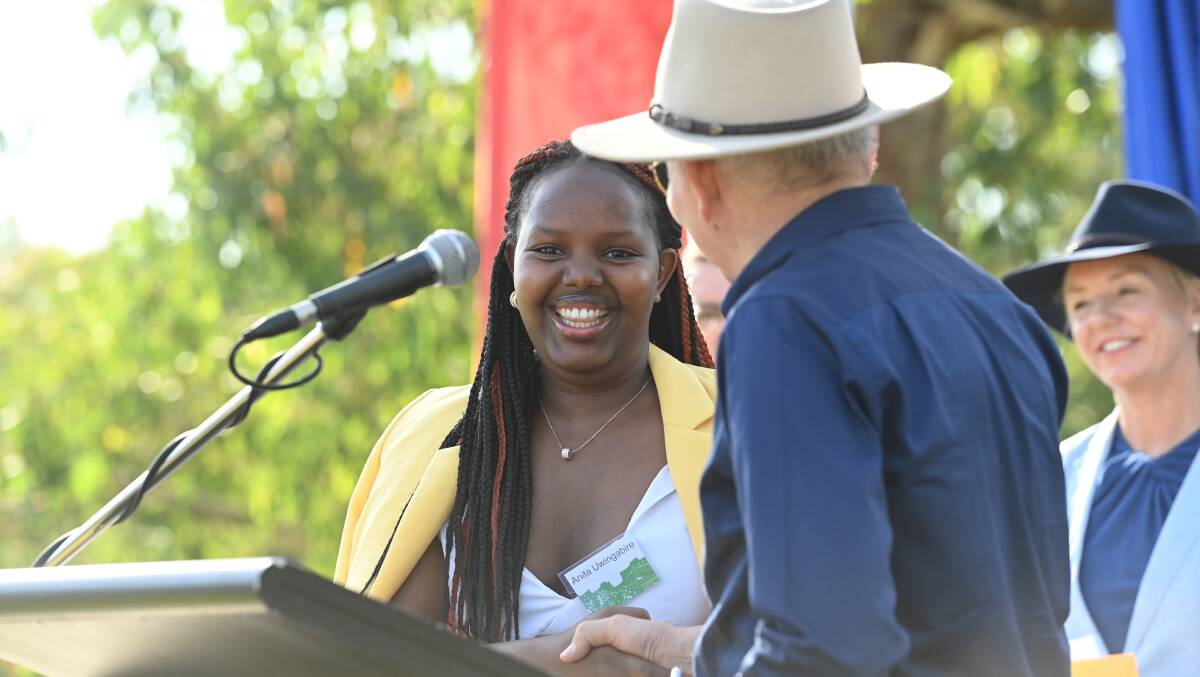 Wodonga mayor Ron Mildren congratulates Anita Uwingabire on becoming an Australian citizen at the 2023 Australia Day function run by the city council. Such presentations will continue on January 26 in Wodonga.