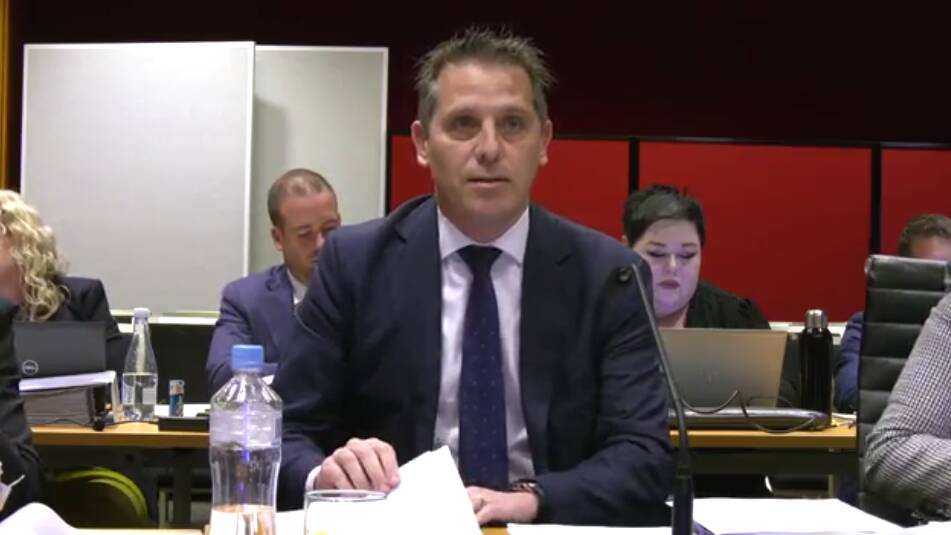 A still image taken from a camera recording NSW Health Minister Ryan Park give his evidence about Albury hospital decisions to a parliamentary committee.