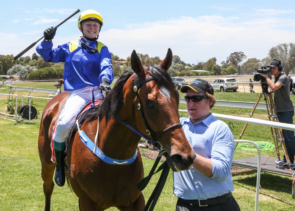 DAY OUT: Brooke Sweeney rode four winners in the heat at Albury on Saturday, including three for her father, Phil. Picture: JAMES WILTSHIRE