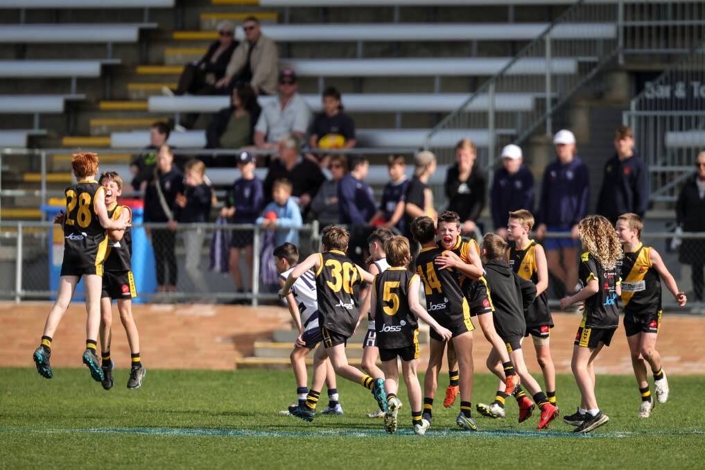 Albury celebrates its win over Yarrawonga in the under 12 grand final. Picture by James Wiltshire
