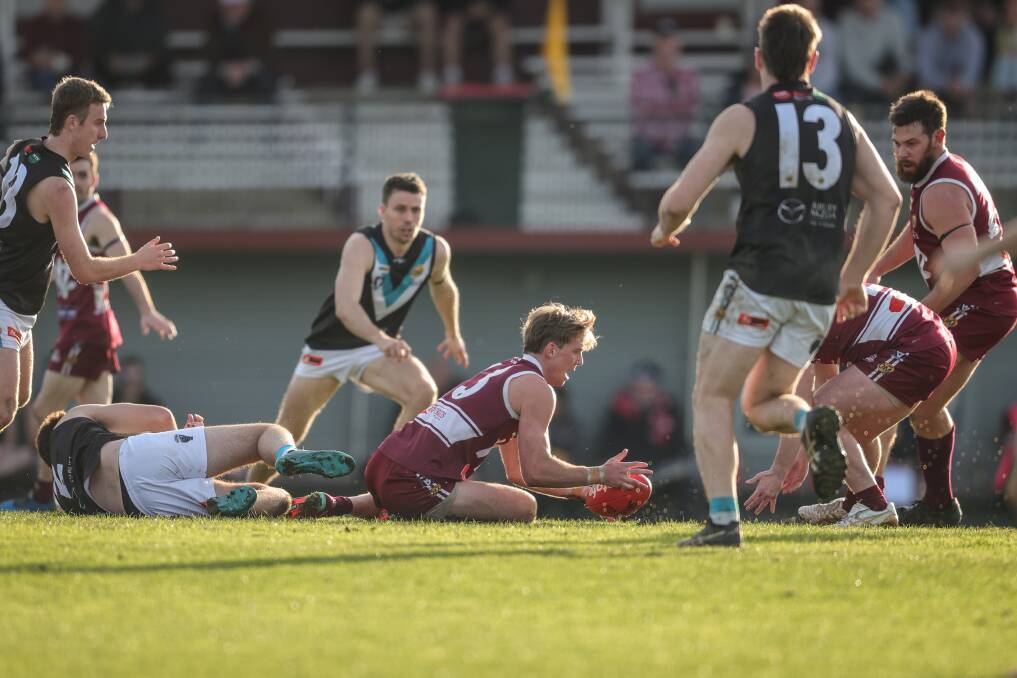Wodonga's Angus Baker wins possession against Lavington. Baker was best on ground with six goals and 30 touches, but Wodonga lost by nine points. Picture by James Wiltshire