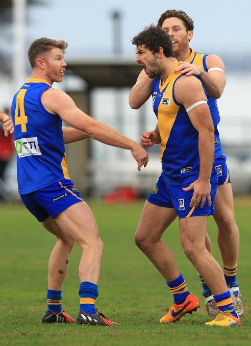 Dylan Conway (centre) kicked three goals in Williamstown's 2015 grand final win.