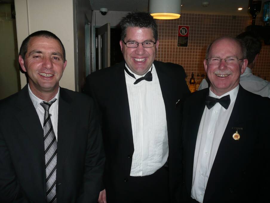 Greg Claney (right) with Myrtleford's Adrian Villella and O and M general manager Tom O'Connor.