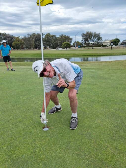 Bob Murray celebrates his maiden hole-in-one on the 14th hole at the Yarrawonga Mulwala Golf Club Resort Lake course on Tuesday. Picture by Barry Sullivan