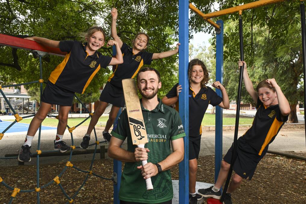 Albury Public School teacher Nick Brown with students, Frankie Lollback, 8, year 3 (left), Margot Ritchie, 8, year 3, Grace Ferguson, 12, year 6 and Tom McSwiney, 10, year 5. Picture by Mark Jesser