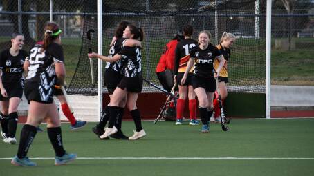 Magpies celebrate Makayla McMillan's goal in the loss to United. Picture by Hockey Albury Wodonga