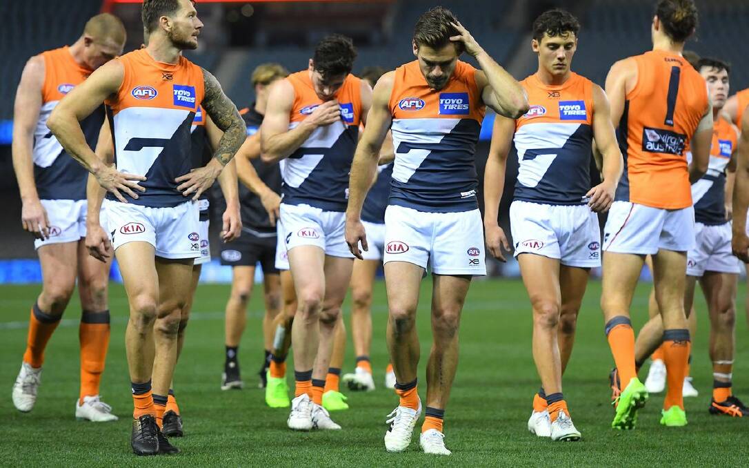 TOUGH DAY: GWS players stream off after the disappointing four-goal loss to Western Bulldogs in their fiery clash last Friday night. Picture: GWS