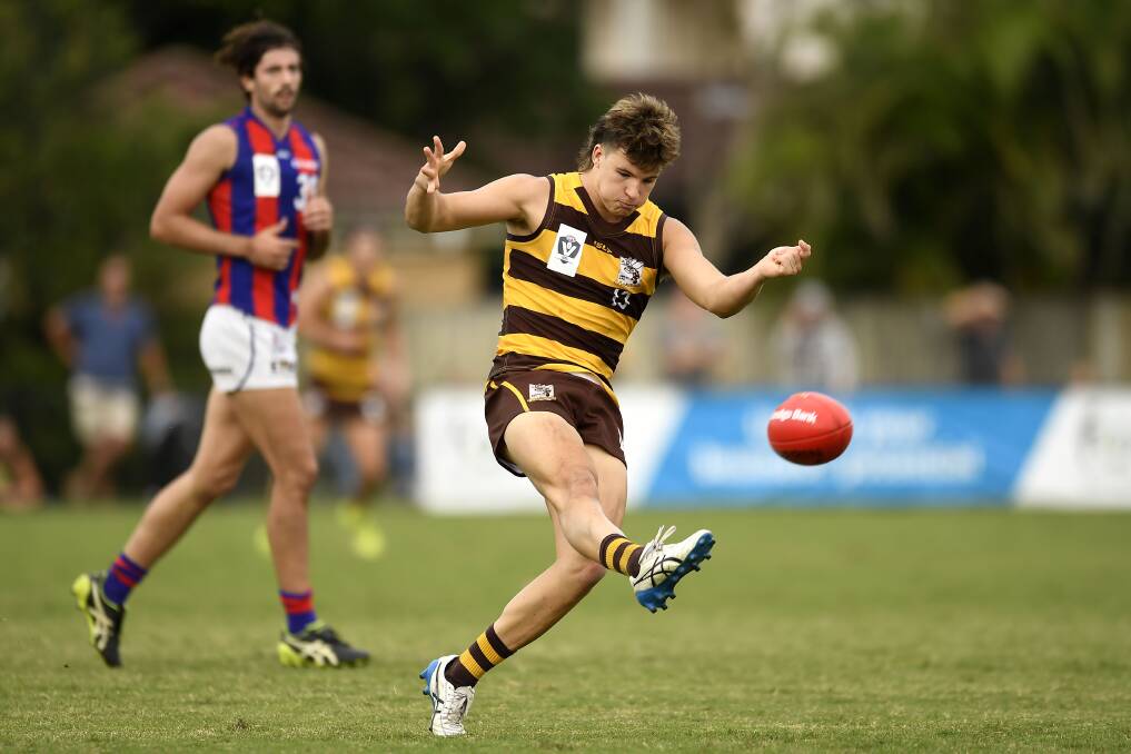 Tom Baulch sends Aspley on the attack against Port Melbourne in the VFL last year. Picture by Getty Images