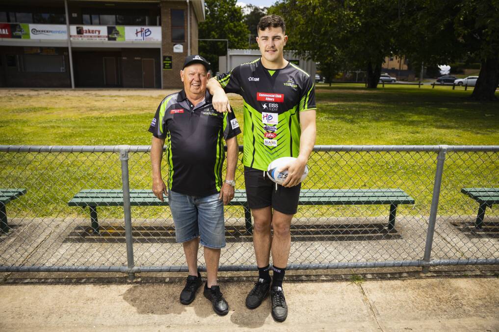 Albury Thunder recruit Isaac Carpenter is 198cms and towers over club president Herb Stratton. The youngster has headed home to Queensland for Christmas, but will be back for pre-season training. Picture by Ash Smith