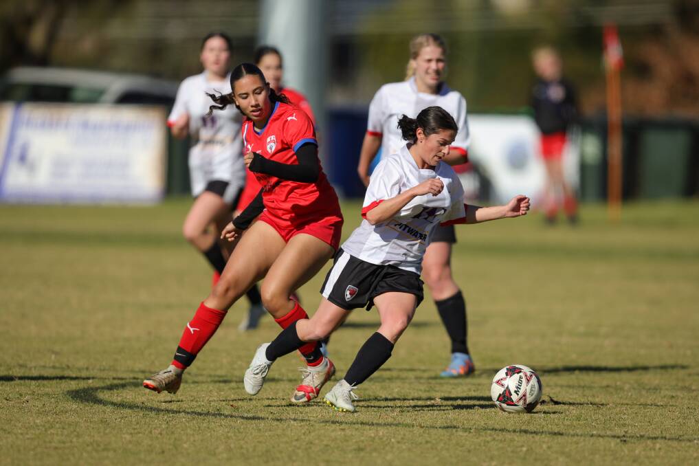 Boomers FC's Isabella Barbaro (front) scored one of her team's goals in the win over Wodonga Diamonds on Sunday. Picture by James Wiltshire