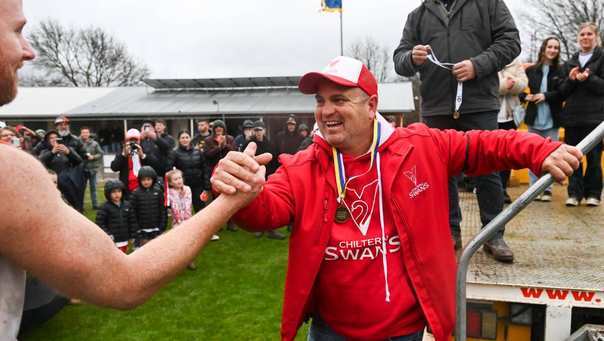 Swans coach Luke Brookes finally got his hands on a premiership medallion after being appointed coach in 2018. Pictures by Mark Jesser