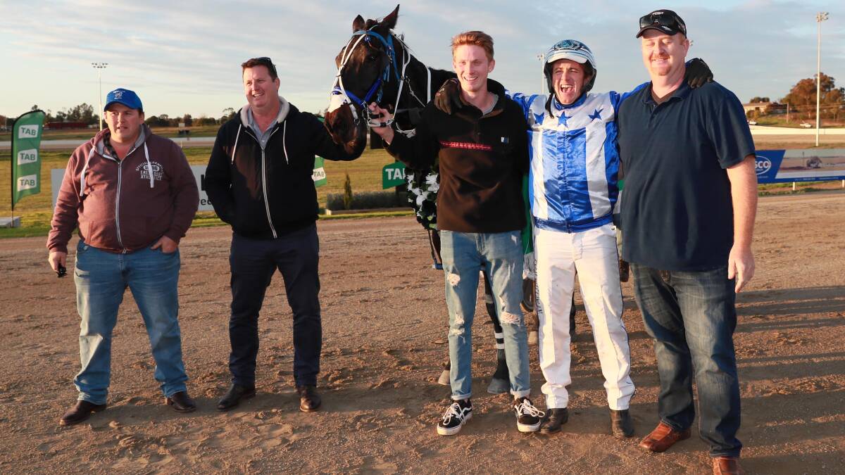 YOU BEAUTY!: Tom Gilligan and the McPherson family celebrate's Rocky Creed's group one victory. 