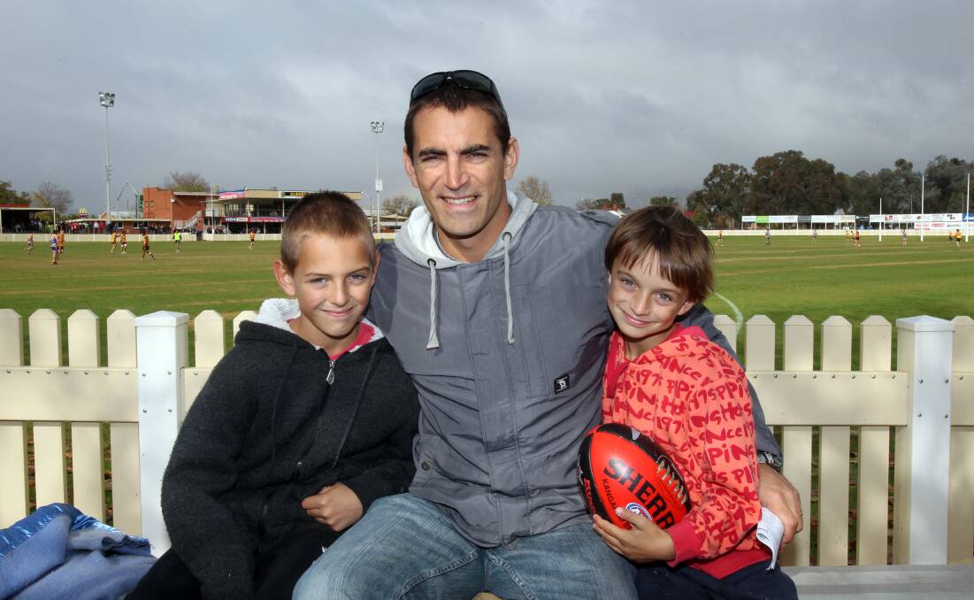 McAlister with his two sons Bailey and Oliver in 2012.