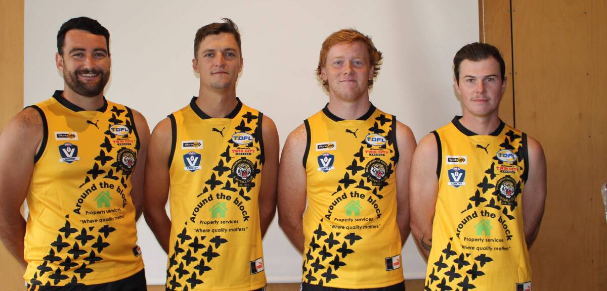 Barnawartha players Seamus Quinn, Brad Dalbosco, Will Prichard and Brodie Scammell wearing the Tigers' specially designed jumper.