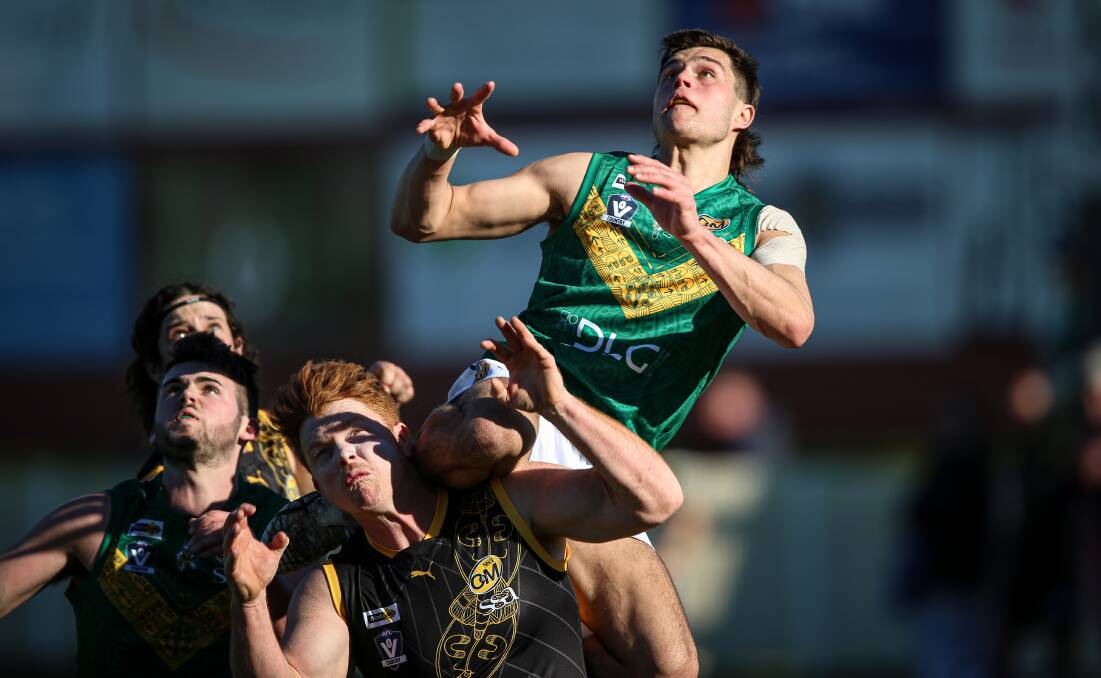 HANGER: North Albury's Carter Norman flies high for a grab against Albury on Saturday. Picture: JAMES WILTSHIRE