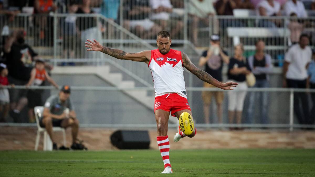 SHARPSHOOTER: Buddy Franklin takes a set shot at goal for the Swans.