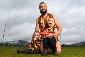 Kiewa-Sandy Creek defender Cal Turner pictured last year with his two boys Albert and Vance. Picture by Mark Jesser