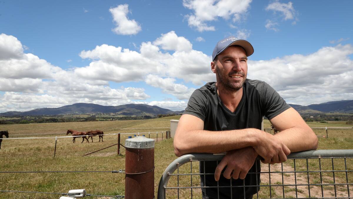 Jonathon Ceglar relaxes on his farm on the outskirts of Yackandandah. Picture by James Wiltshire