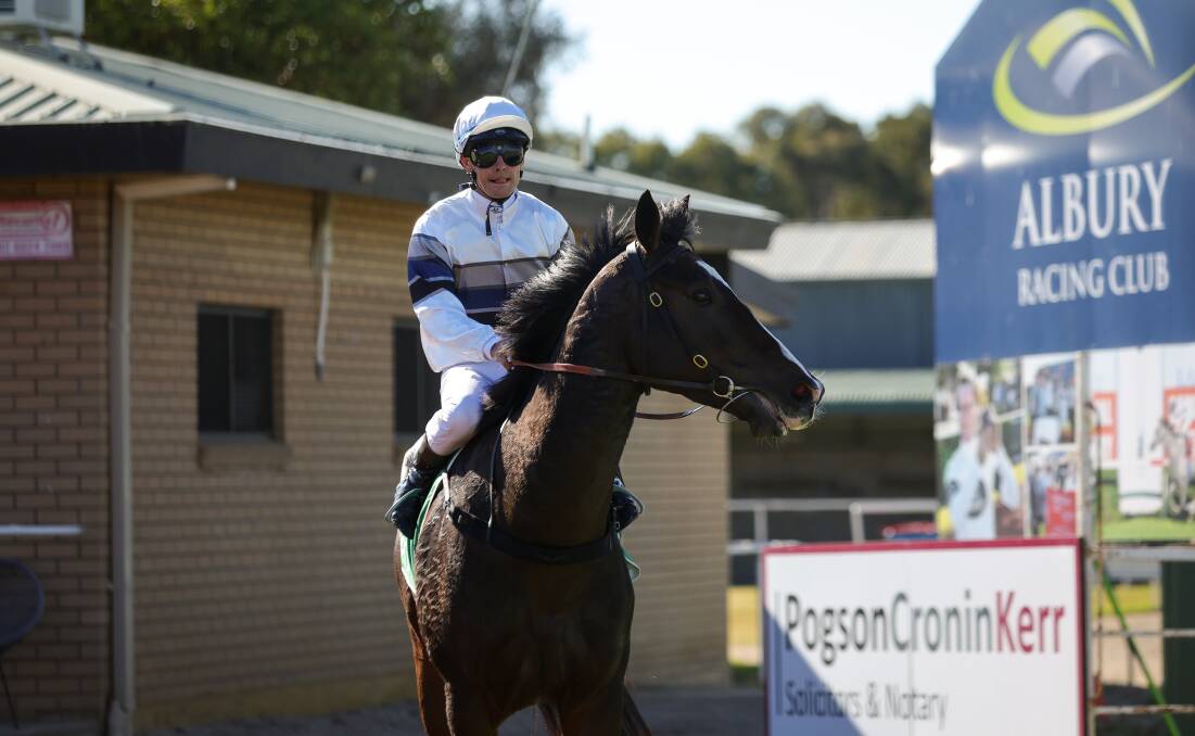 Jockey Mathew Cahill returns to scale aboard Cooee. Picture by James Wiltshire