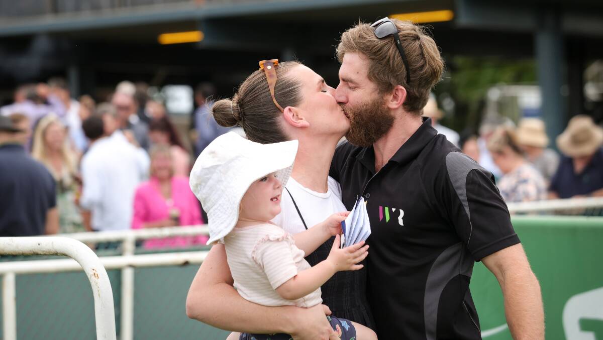 Jesse Wellington celebrates the win of Smiler Marshall with his wife Emma and daughter, Pippa. PIcture by James Wiltshire